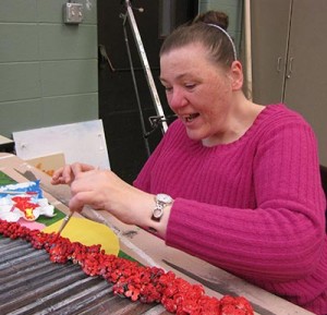 Smiling Noble participant painting