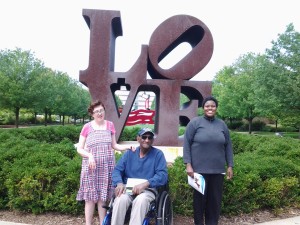 Three Noble participants in front of the "LOVE" sculpture at the IMA.