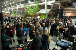 Large crowd of people gathered at Noble Evening in the Garden fundraising event.